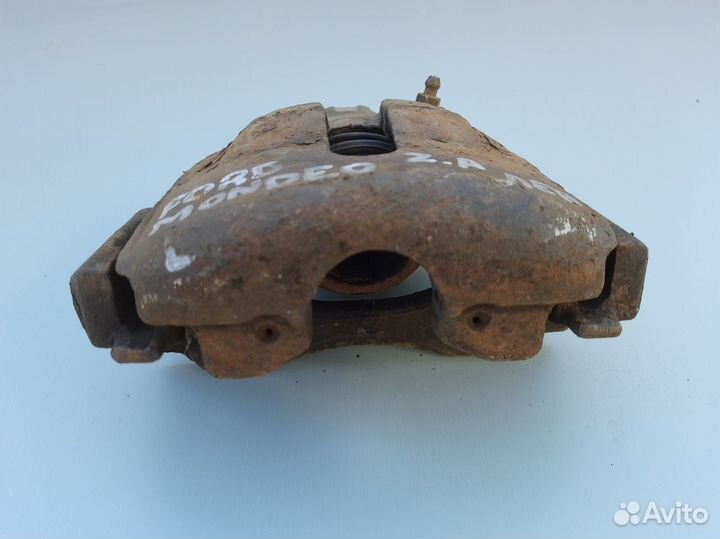 Суппорт передний левый Ford Mondeo 1