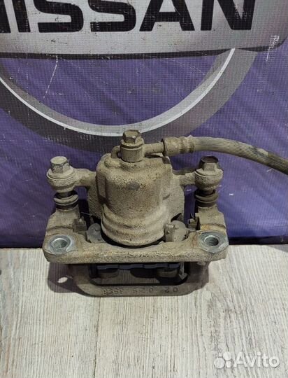 Суппорт тормозной задний Nissan juke F15 Лев