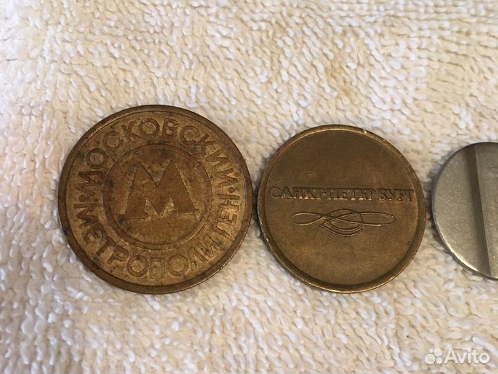 Жетоны метро и телефоные