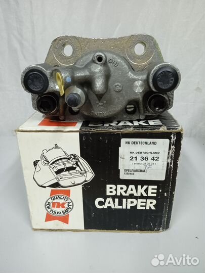 Тормозной суппорт Опель Кадет Е Вектра А