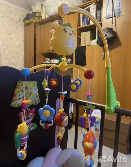 Электронные качели с мобилем