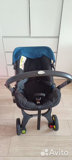 Коляска автокресло doona с базой isofix