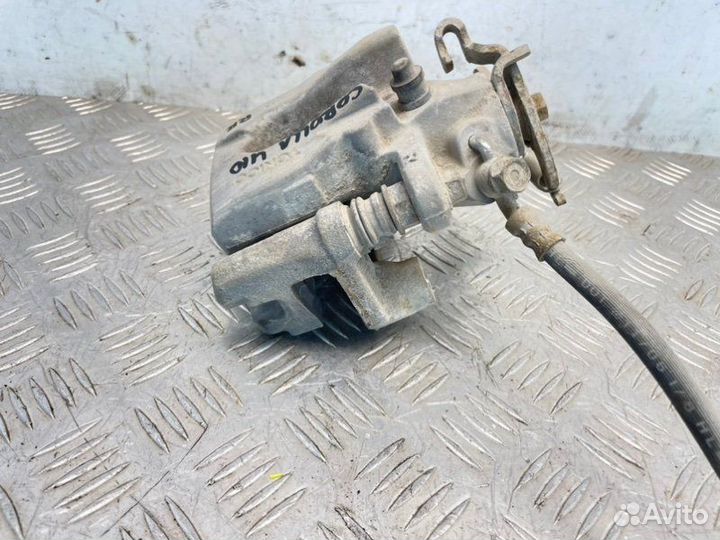 Суппорт тормозной задний правый Toyota Corolla