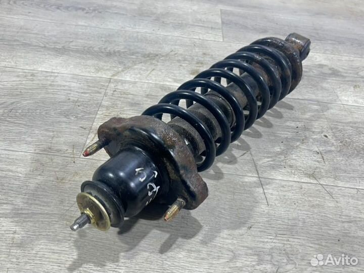 Амортизатор задний Mitsubishi Lancer седан 4G18