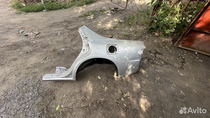 Крыло заднее левое toyota carina ed