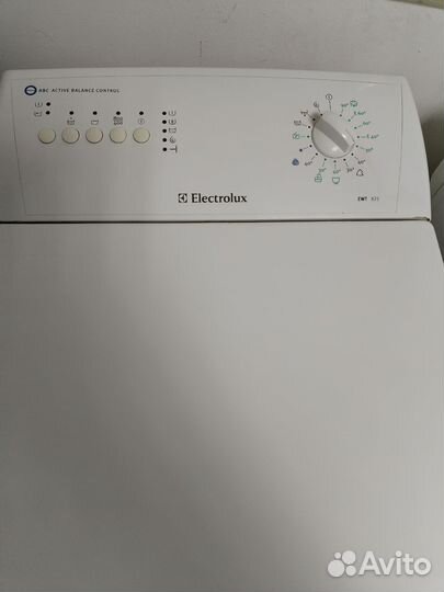 Electrolux с вертикальной загрузкой