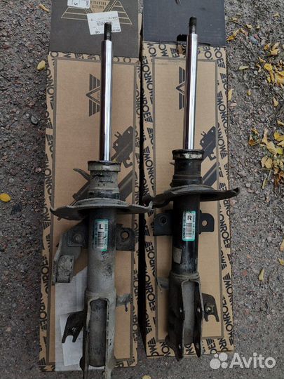 Передние стойки Mazda 2