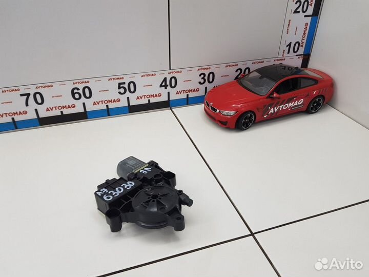 Моторчик стеклоподъемника задний левый