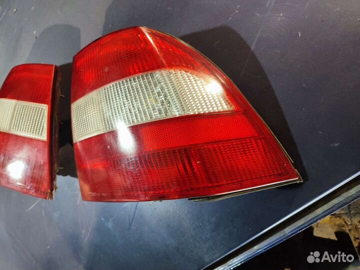 Фонарь задний левый опель вектра б