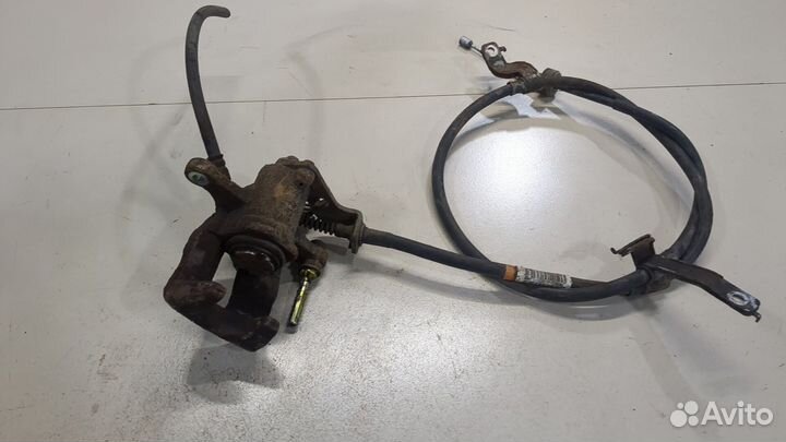 Суппорт левый задний Hyundai i20 2014