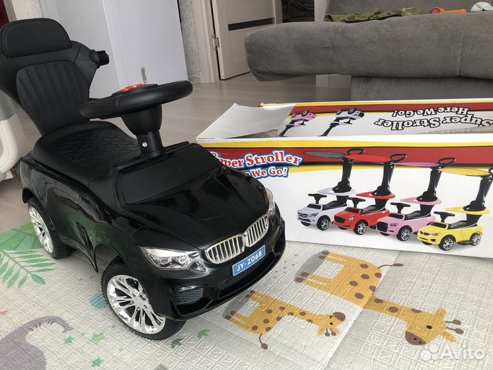 Машинка каталка толокар с ручкой