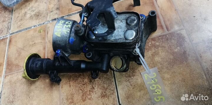 Радиатор масляный Opel Astra