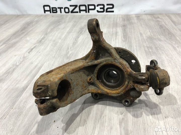 Кулак поворотный передний правый Citroen C-Elysee