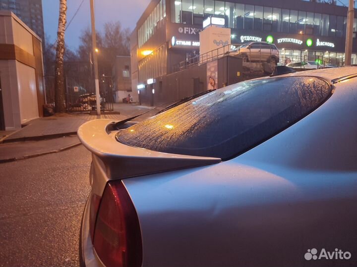 Спойлер mitsubishi carisma