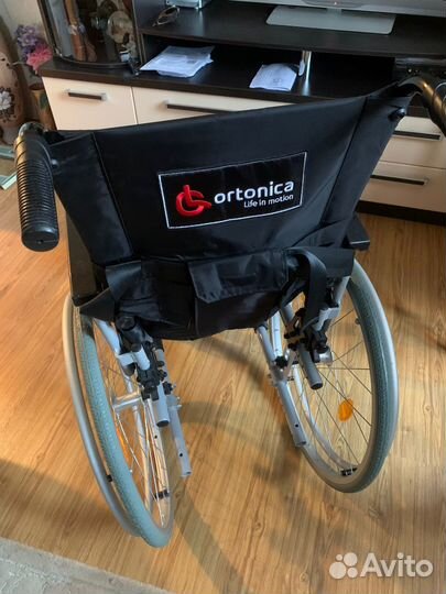 Регулируемая кресло - коляска для инвалида