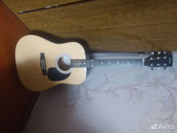 Акустическая гитара