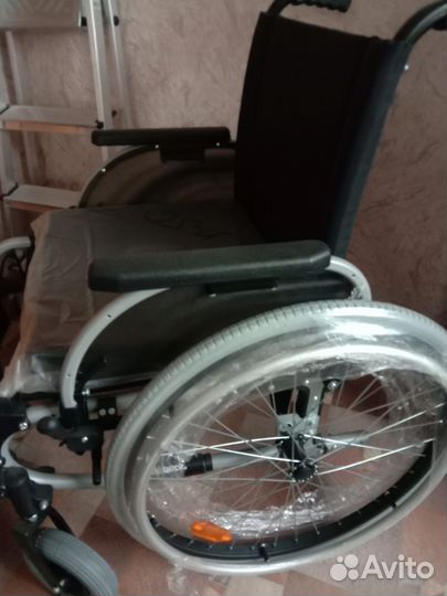 Инвалидная коляска