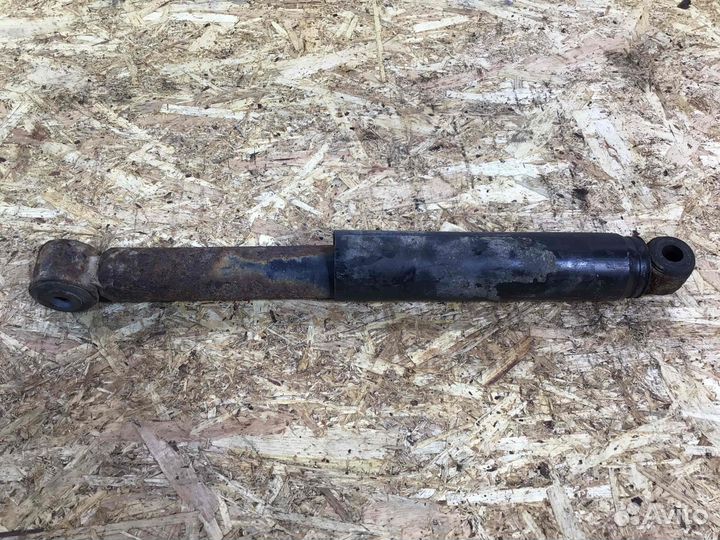 Амортизатор задний Nissan Navara 56200EB30A YD25