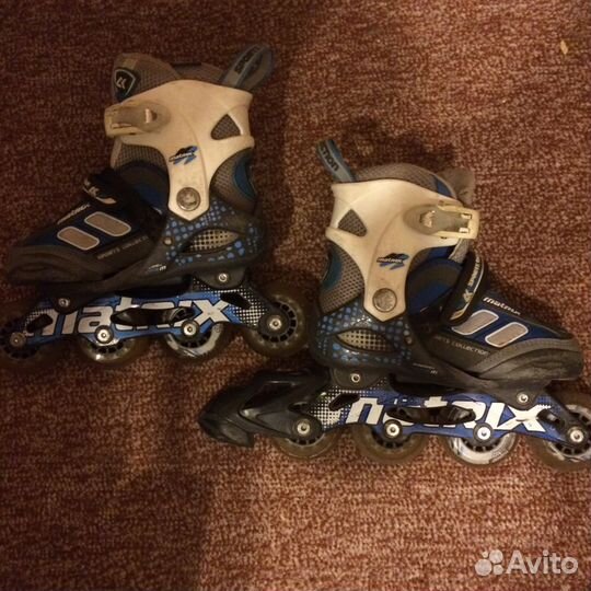 Роликовые коньки