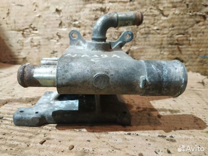 Корпус термостата Mazda 6GG 2.0