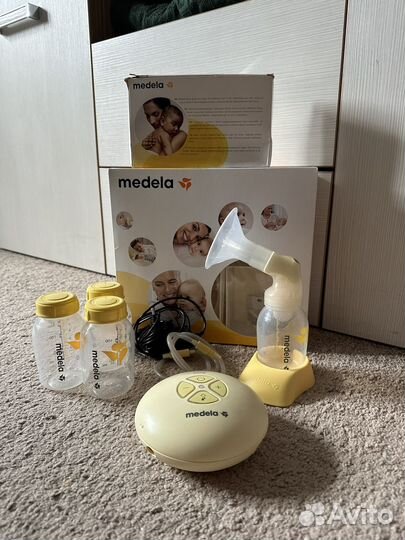 Молокоотсос medela электрический