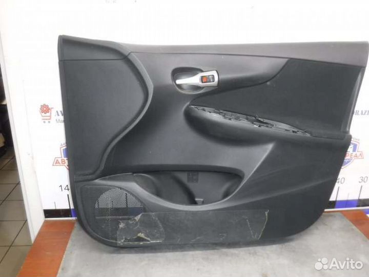 Обшивка двери передняя правая Toyota Corolla 151