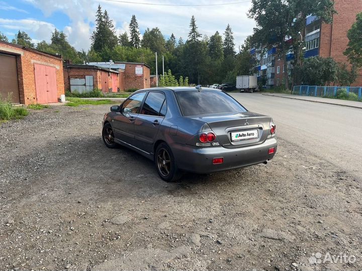 Mitsubishi Lancer 1.6 МТ, 2006, 192 672 км