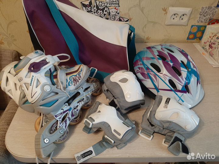 Роликовые коньки