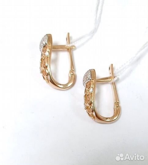 Золотые серьги с камнем