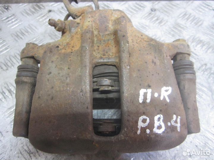 Суппорт тормозной передний Volkswagen Passat B4