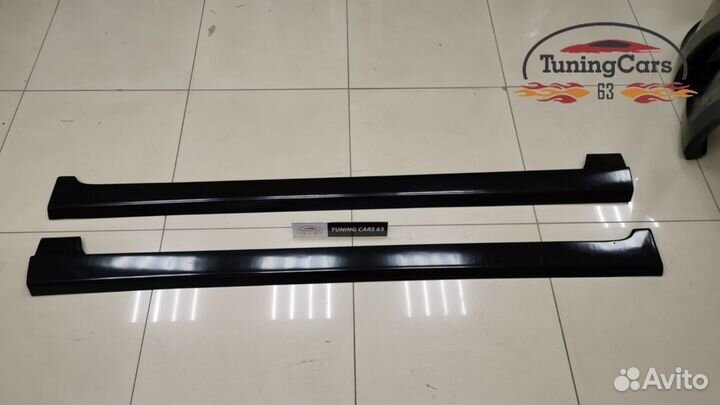 Накладки на пороги Пластиковые на Ford Focus II