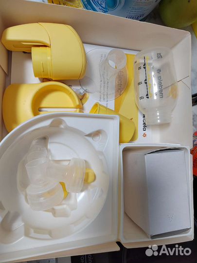 Молокоотсос medela электрический