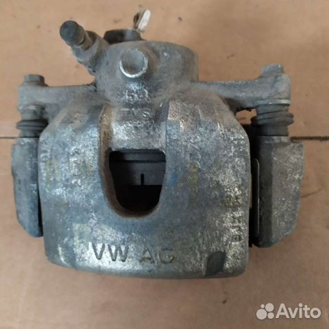 Skoda Octavia суппорт передний правый