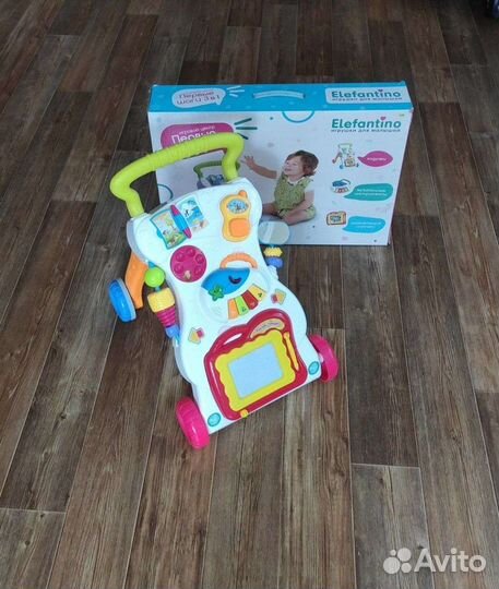 Детская электронная карусель и ходунки каталка