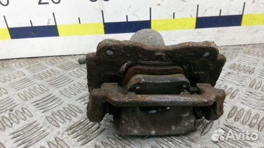 Суппорт тормозной задний правый toyota corolla ver