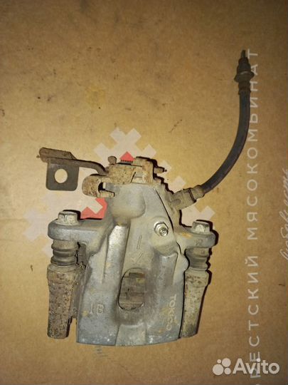 Суппорт задний на Тойота королла 150