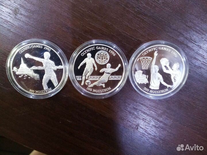 Серебряные монеты к олимпиаде. Бутан и Непал