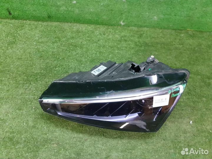 Фара левая Skoda Rapid