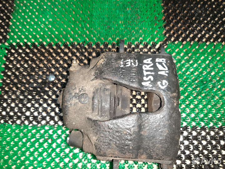 Суппорт Opel Astra 93176427 G, передний левый