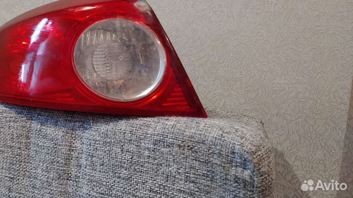 Фонарь задний левый внешний Lacetti