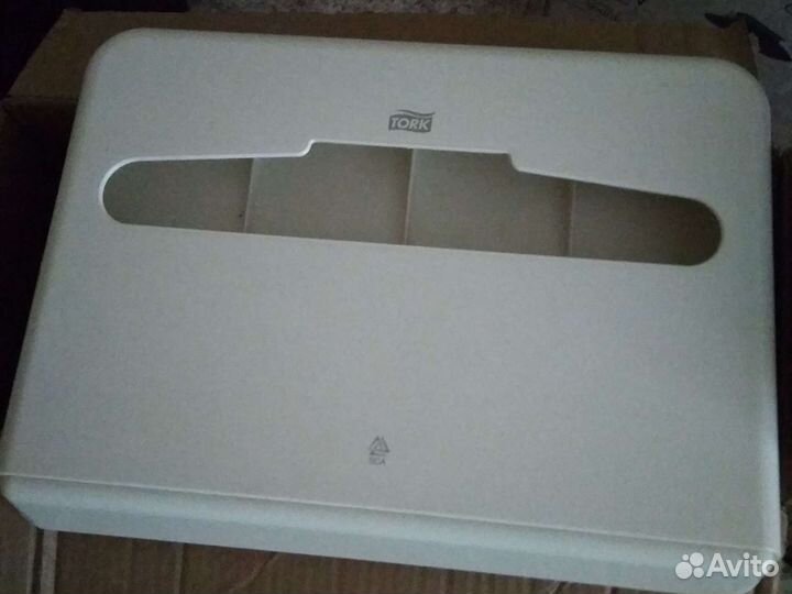 Tork индивидуальные бумажные покрытия на унитаз