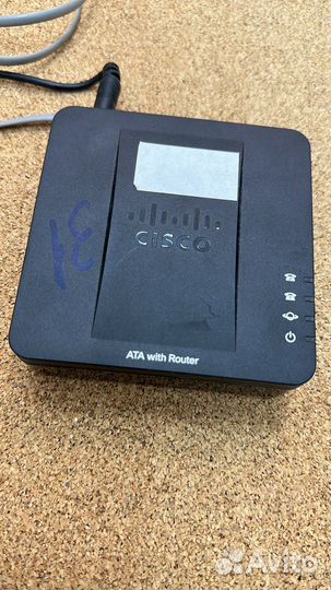 Адаптер для VoIP-телефонии Cisco SPA122