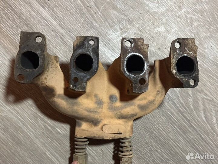 Выпускной коллектор Opel Vectra A E18NVR 1989