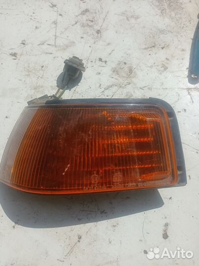 Габарит Mazda Familia левый