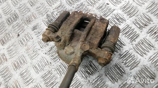 Суппорт тормозной задний правый toyota corolla E12