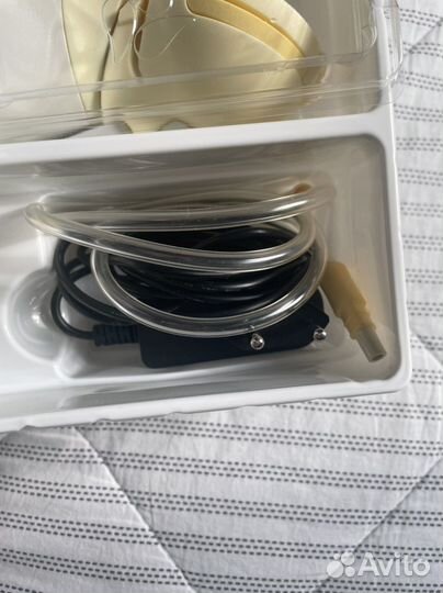 Молокоотсос medela электрический