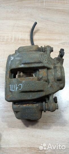 Суппорт тормозной передний левый Mercedes-Benz