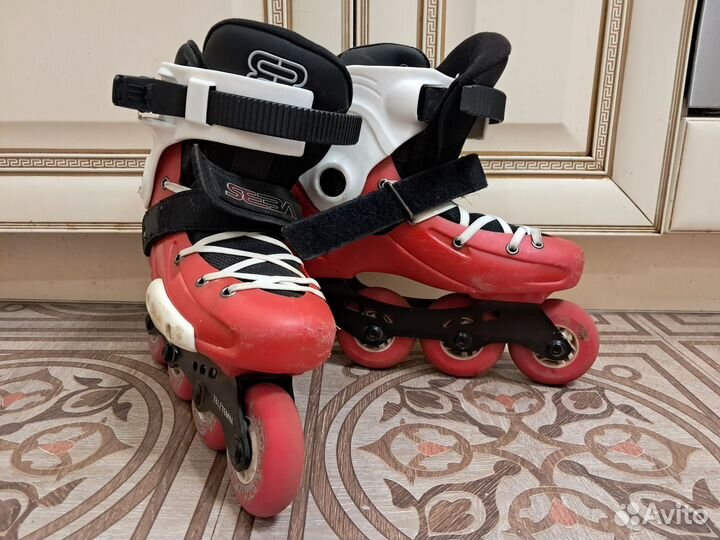 Роликовые коньки