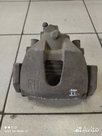 Суппорт тормозной передний правый Ford Focus 2