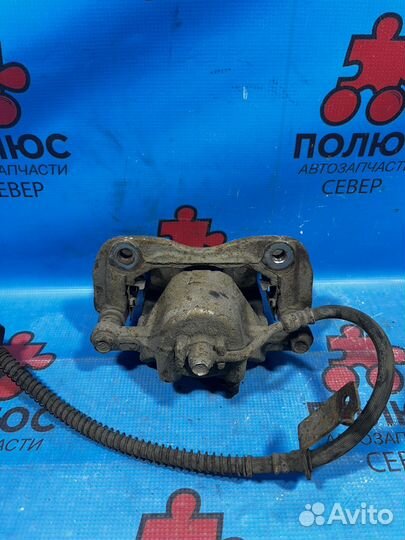 Суппорт передний левый Киа Рио 4